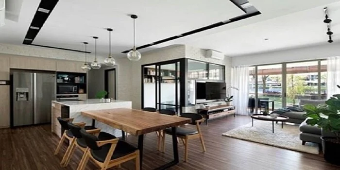 تصویر یک میز ناهارخوری چوبی 4 نفره در فضای آشپزخانه و پذیرایی یک ویلای بزرگ